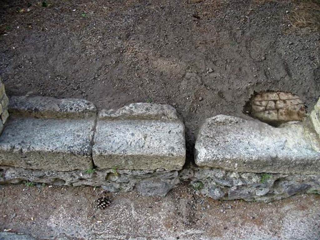 V.32 Herculaneum. May 2003. Threshold or sill of entrance doorway, looking west. Photo courtesy of Nicolas Monteix.